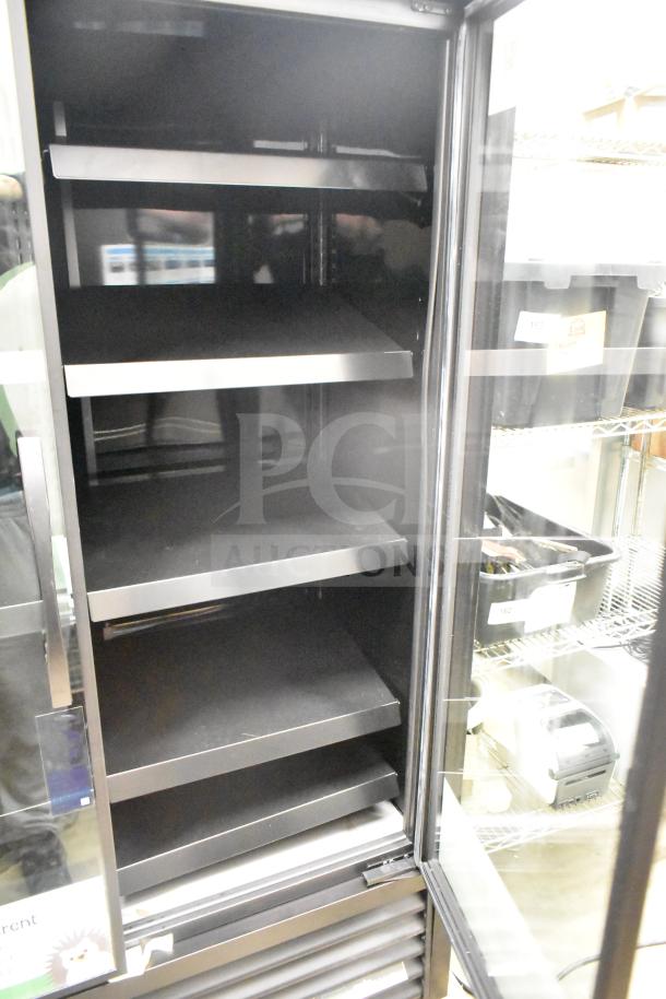 2025 True TVM-48SL-HC Commercial 2 Door Reach-In Cooler. Black interior, adjustable shelves, 115V, 1 Phase.