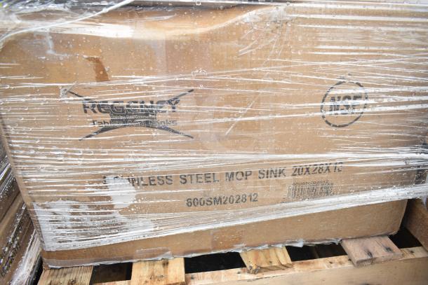 Cardboard box labeled Regency Stainless Steel Mop Sink, 20x28x12. Wrapped for protection. Contains scratch and dent items.