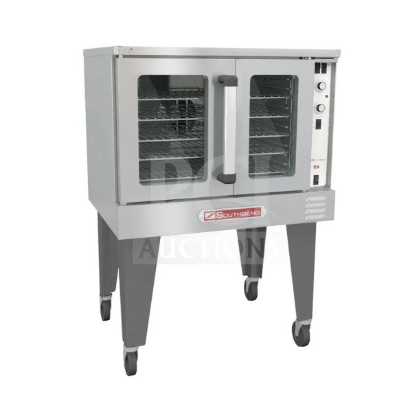 Brand new Southbend BGS/13SC stainless steel natural gas convection oven on legs, 120V, with control panel and glass doors.