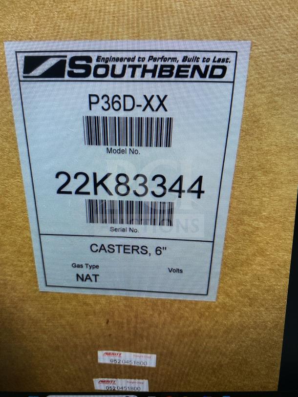 BRAND NEW Southbend P36D-XX 36" 4-burner range/oven combo on casters, serial 22K83344, natural gas, stainless steel.