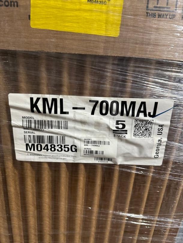 Brand new Hoshizaki KML-700MAJ ice maker, stainless steel, electric, crescent cube style, air-cooled, SN: M04835G.