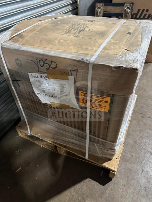Brand new Hoshizaki KML-700MAJ ice maker in box on pallet. Model: KML-700MAJ, SN: M04835G, air-cooled, crescent cube style.