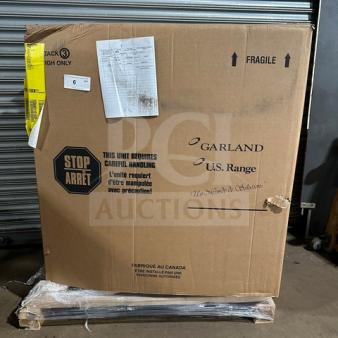 NEW Garland C18-1-1M 18" Gas Griddle, 30000 BTU, in box. Scratch-N-Dent condition, includes labels and handling instructions.