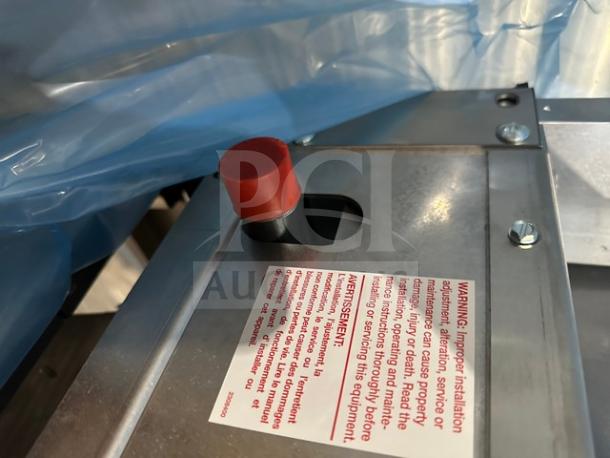 Garland C18-1-1M 18-inch gas heavy-duty range griddle. New, scratch-and-dent condition with warning label visible.