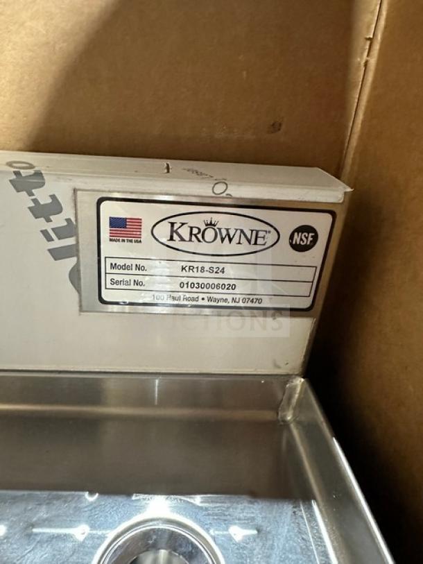 Brand new Krowne stainless steel under-counter bar glass dry rack, Model KR18-S24, Serial 01030006020, on legs.