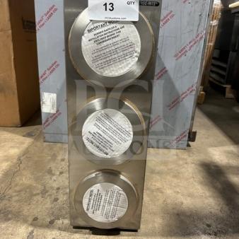 Brand new Dispense-Rite 3-hole cup dispenser unit in stainless steel, vertical design. Includes installation instructions visible.