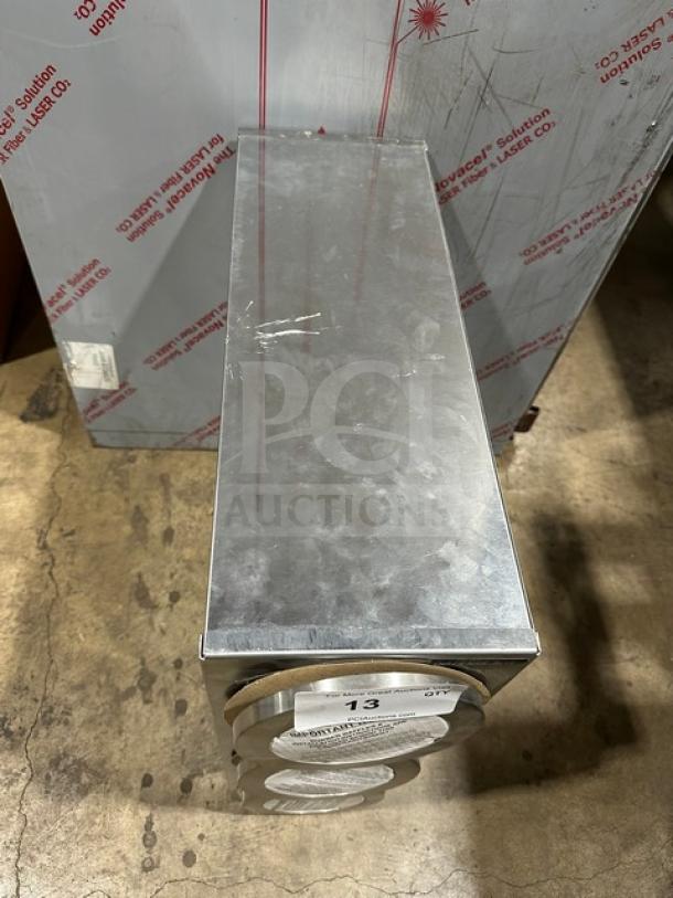 Brand new Dispense-Rite drop-in 3-hole cup dispenser unit, stainless steel, with protective film.