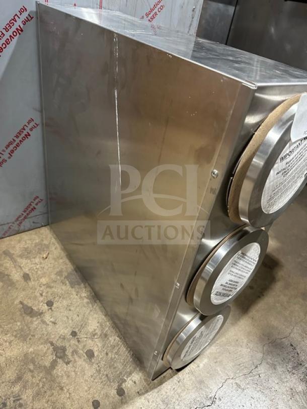 Brand new Dispense-Rite 3-hole cup dispenser unit in stainless steel. Out of the box, perfect condition. Markings show model details.