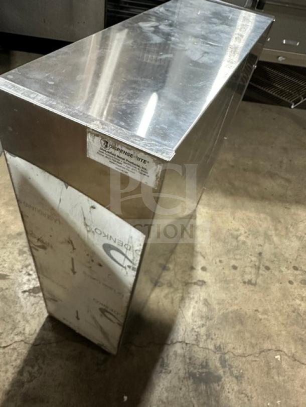 Brand new Dispense-Rite drop-in 3-hole cup dispenser unit, stainless steel, with manufacturer's label, pristine condition.