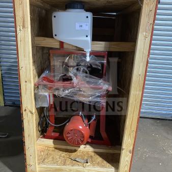 Brand new Meadows Mills MQ098 commercial grain mill in crate, 220V 1-phase, serial MQ098S057, features steel burr construction.