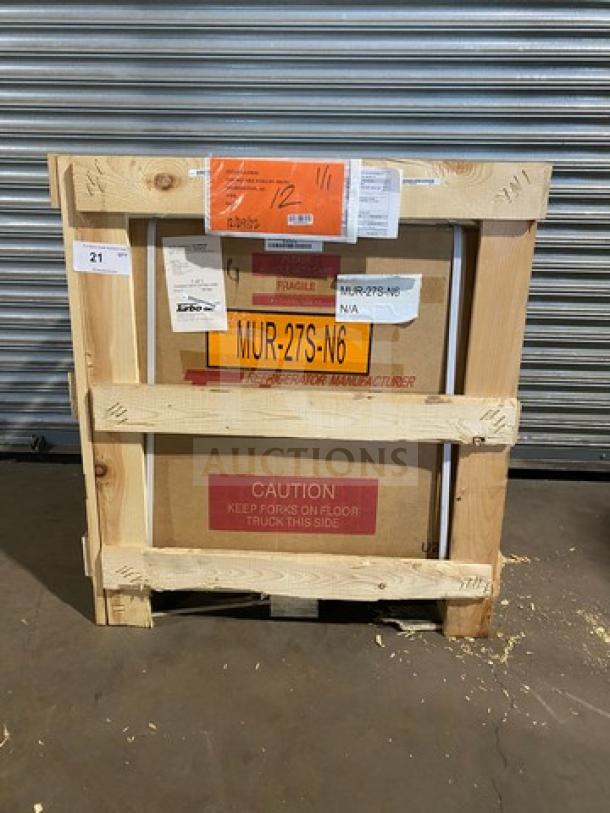 Brand new Turbo Air M3 MUR-27S-N6 undercounter refrigerator in crate, model MUR27S-N6, with tags and caution markings.
