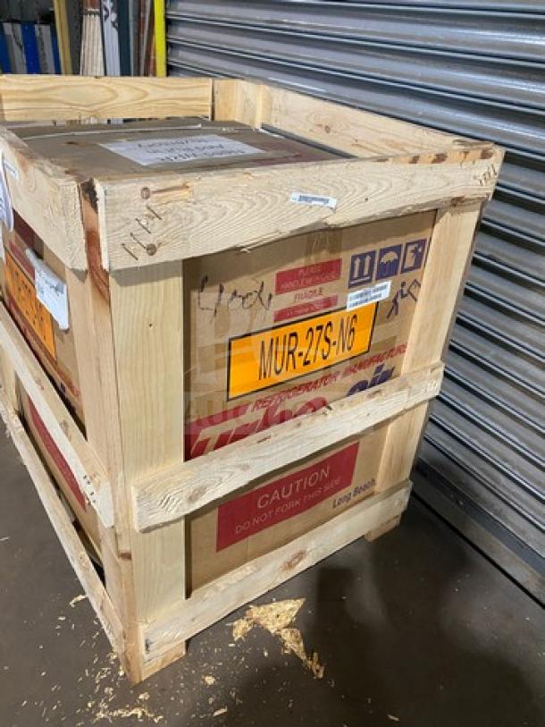 Brand new Turbo Air M3 MUR-27S-N6 undercounter refrigerator in crate, model MUR27SN6, 115V, on casters, labeled.