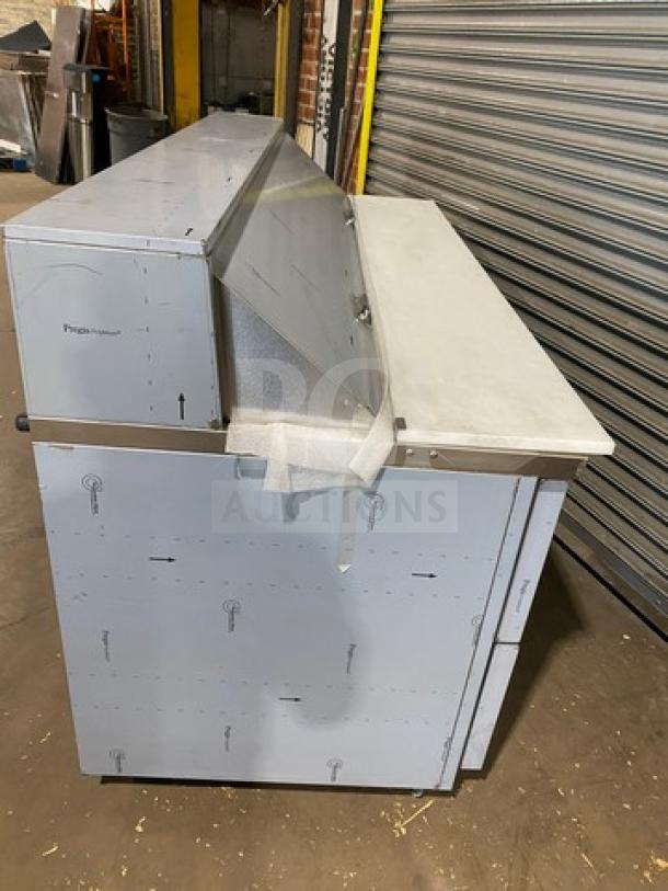 Brand new Traulsen CLPT7220 refrigerated Bain Marie, 72", 6 drawers, on casters. Out of the box, pristine condition.