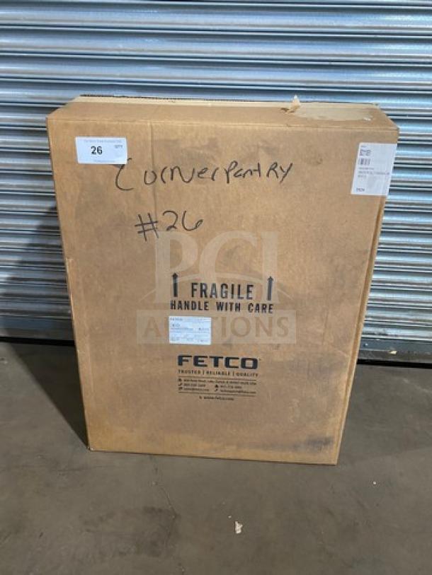 Brand new Fetco HWB-2110 10-gallon hot water dispenser in original box. Model HWB2110, marked "Fragile" and "#26".