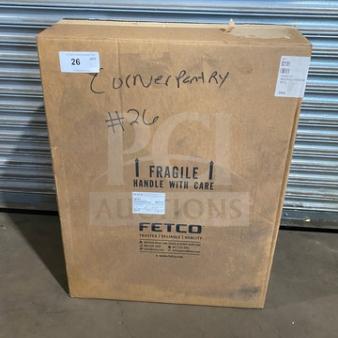 Brand new Fetco HWB-2110 10-gallon hot water dispenser in original box. Model HWB2110, marked "Fragile" and "#26".