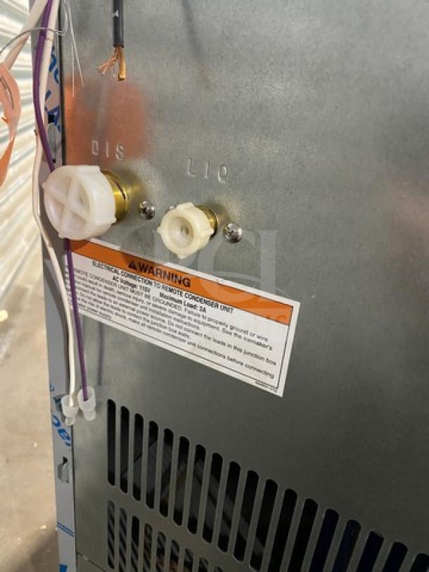 Hoshizaki KM520MRJ ice maker, new out of box, 115V, 1 phase, with visible connectors and warning label.
