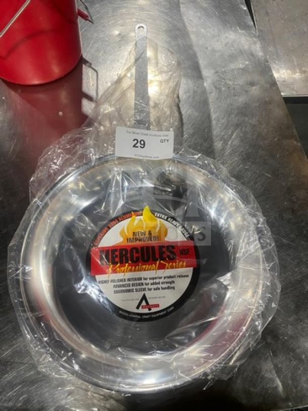 Brand New Adcraft stainless steel skillet, labeled "Hercules NSF," in original packaging, ideal for sizzling and frying.
