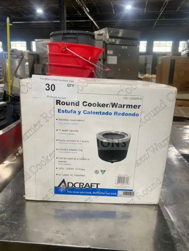 Adcraft 11Q Round Warmer/Cooker model FW1200WRB in box, 115V, new condition. Box features product details and brand logo.