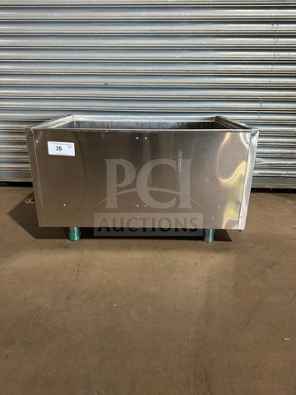 New Krowne Model KRPT2436 stainless steel ice bin in excellent condition; features durable construction.