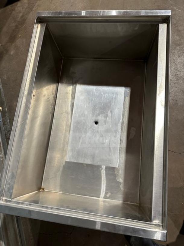 Krowne KRPT2436 stainless steel ice bin, new condition, deep basin, and drainage hole shown. Ideal for bars or restaurants.