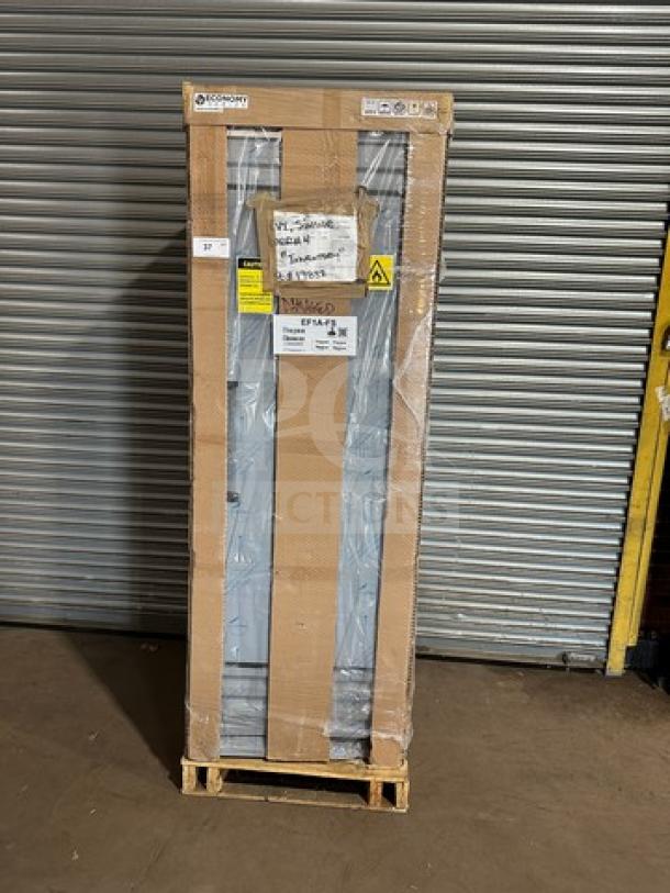 Brand new Hoshizaki EF1A one-door stainless steel reach-in freezer, in box on pallet. Scratch-N-Dent, on casters. Serial L00648H.