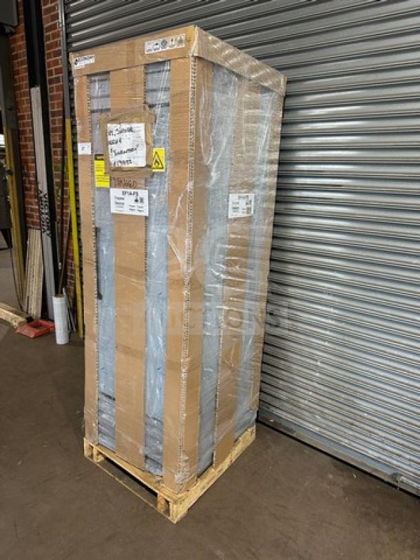 Hoshizaki EF1A stainless steel reach-in freezer, brand new in box, on casters, labeled for scratch-and-dent sale.