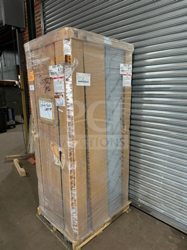 Brand new Hoshizaki R1A-FS stainless steel reach-in cooler, in box, on casters. Model and serial labels visible.