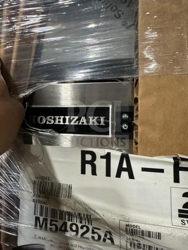 Brand new Hoshizaki R1A-FS stainless steel reach-in cooler, model R1A-FS, serial M54925A, 115V, 1 phase, on casters.