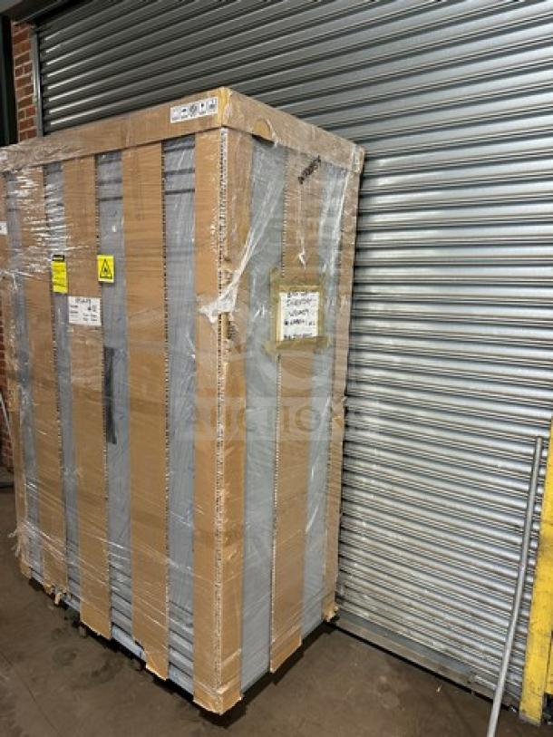 Brand new Hoshizaki EF2A-FS 2-door stainless steel reach-in freezer, wrapped in packaging, on casters. 115V, 1 phase.
