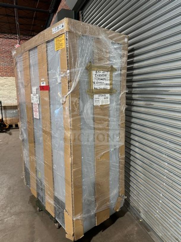 Brand new Hoshizaki EF2A-FS 2-door stainless steel reach-in freezer, in box, on casters. 115V 1Phase, serial L006007E.