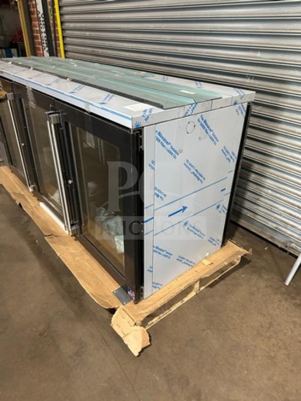 Brand new Perlick PTS84RF 3-door glass bar back cooler with stainless steel work top, 115V, visible packaging wrap.