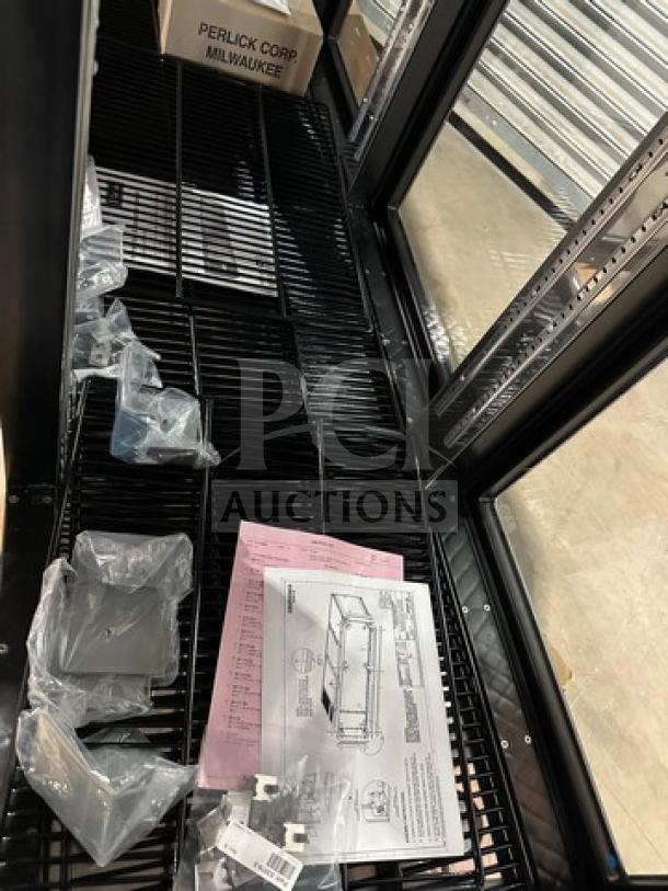 Perlick 3 Door Glass Bar Back Cooler, Model PTS84RF, brand new, stainless steel worktop, visible instruction manual.