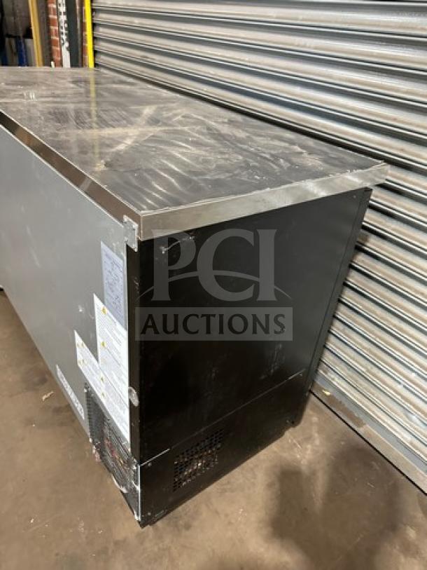 Turbo Air TBB2460SBD-N6 bar back cooler, new condition, solid doors, on casters, 120V, 1 phase, stainless steel exterior.