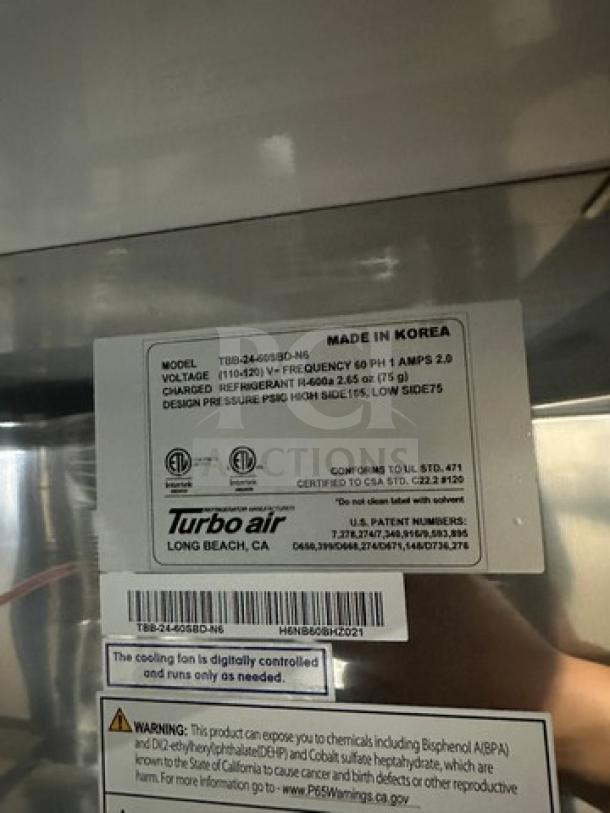 Turbo Air bar back cooler label, Model TBB2460SBD-N6, 120V, 1 Phase, made in Korea, on casters.