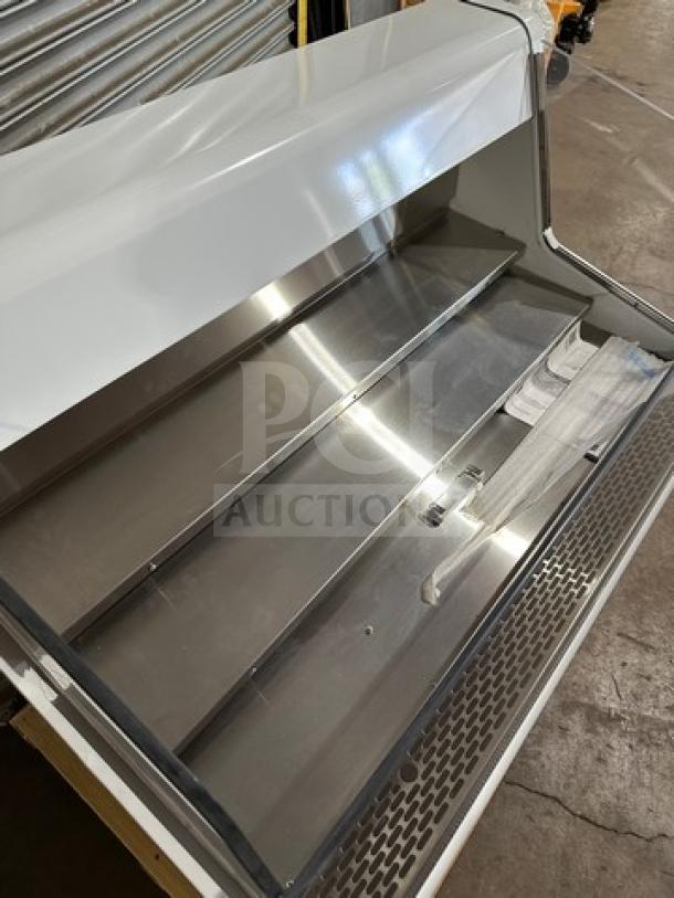 Brand new True THAC48LD refrigerated merchandiser, low-profile, horizontal, curtain open design, serial 9677041.