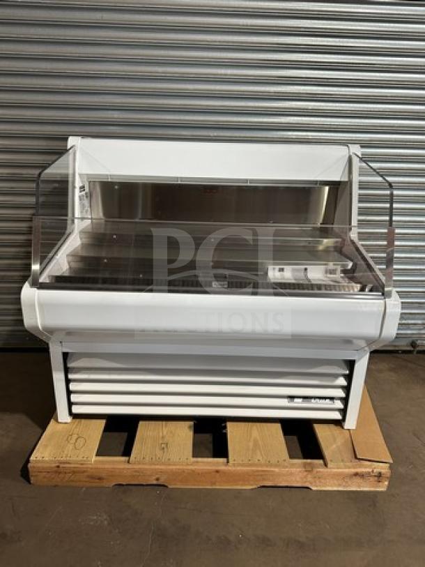 True THAC48LD refrigerated merchandiser, brand new in box, low-profile horizontal design, 115V, 1 phase, on pallet.
