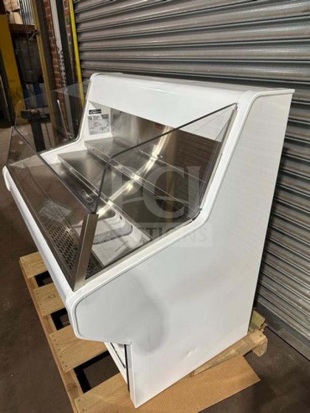 Brand new True THAC48LD refrigerated merchandiser, low-profile, horizontal curtain, 115V, still in box, serial 9677041.