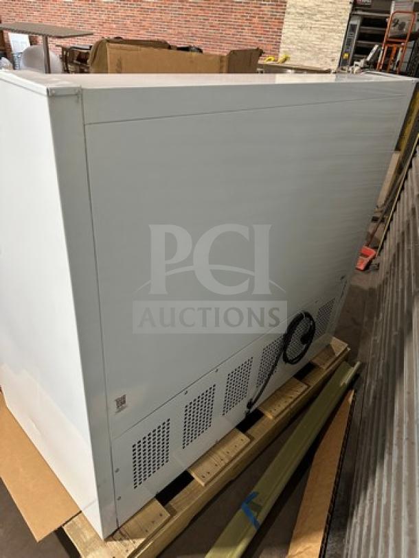 True THAC48LD refrigerated merchandiser, new in box. Low-profile, horizontal design. Serial 9677041. 115V, 1 phase.