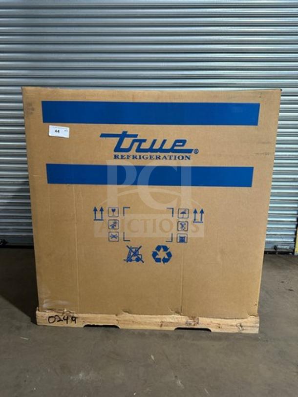 Brand new True Refrigerated Mega Top Sandwich Prep Table, Model TFP48-18MD, in unopened box, on casters.