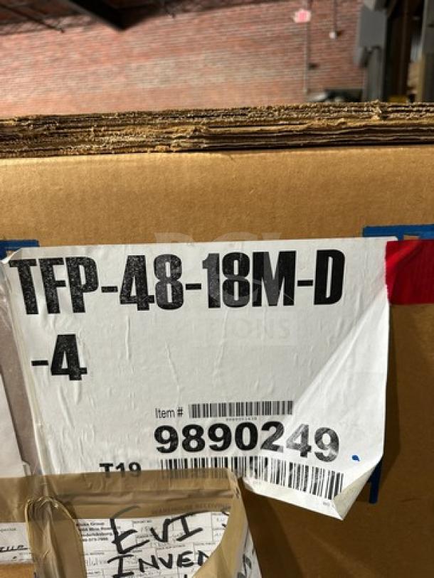 Brand new True TFP48-18MD refrigerated sandwich prep table, serial 9890249, in box, on casters, 115V, 1 phase.