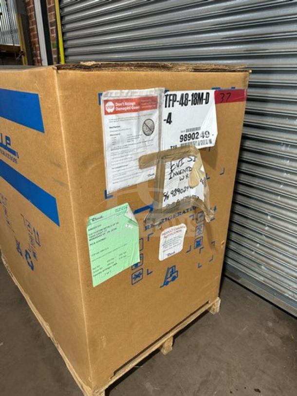 Brand new True Refrigerated Mega Top Sandwich Prep Table, model TFP48-18MD, in box on casters, 115V, 1 phase.