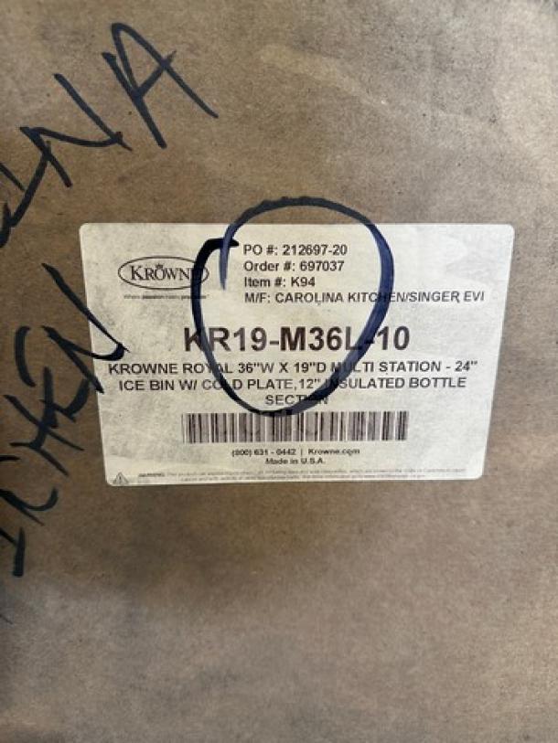 Brand new Krowne Royal KR19-M36L stainless steel ice bin with cold plate and bottle holder, in original packaging.