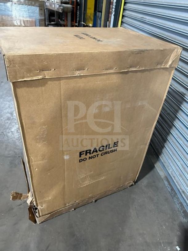 Cardboard box labeled "FRAGILE DO NOT CRUSH," containing new Krowne Royal KR19-M36L stainless steel ice bin.