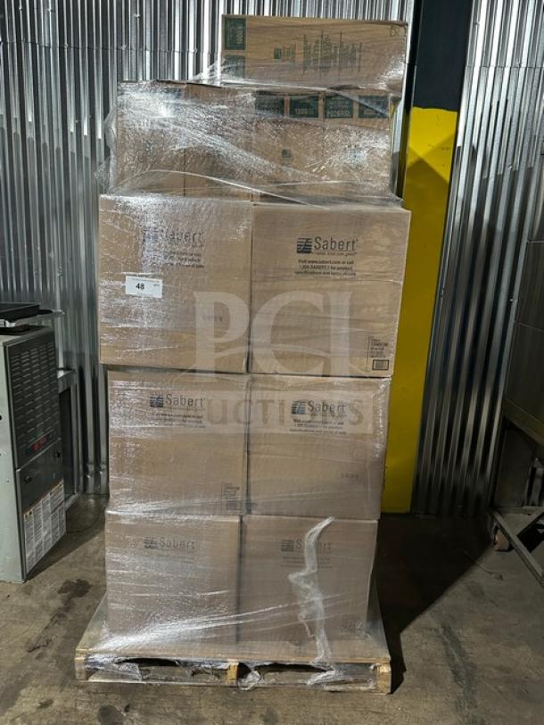 Mixed pallet with 26 cases of Sabert FreshPack dome lids for 48 oz bowls, 5 cases of Dart hot beverage lids, and 1 case of classic dessert lids, brand new in packaging.
