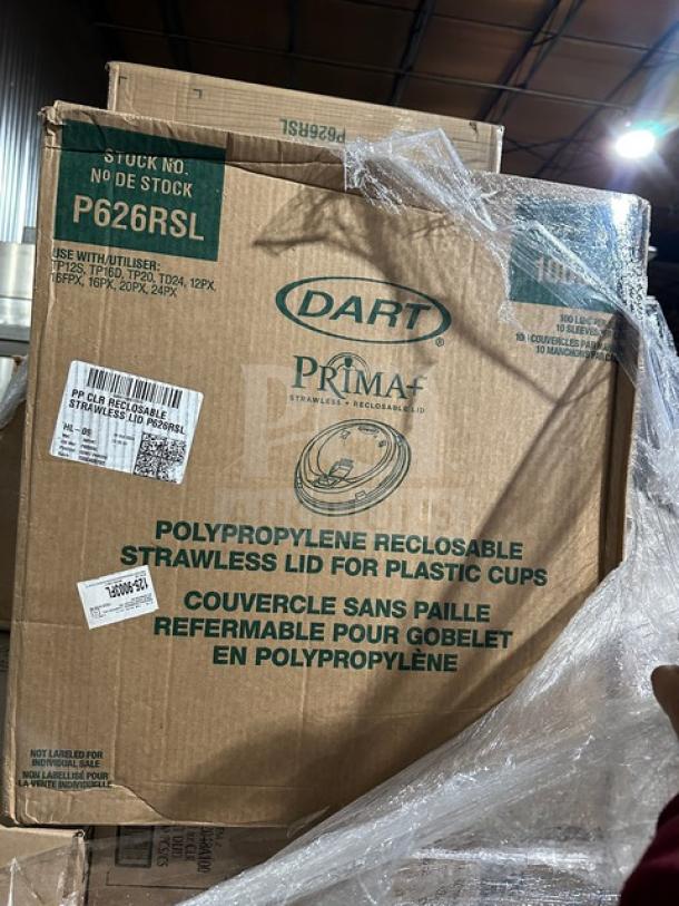 Boxes of Dart Prima plastic cup lids wrapped in pallet film, labeled with item and recycling details.