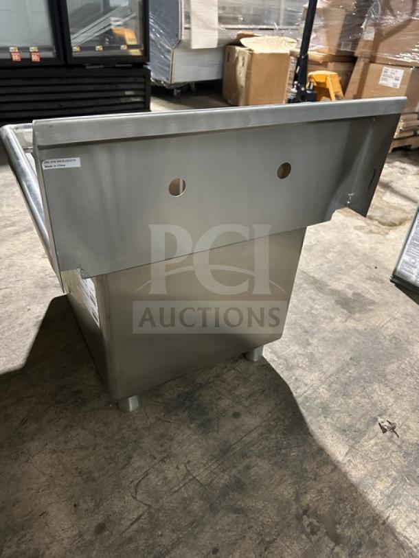 Brand new NBR stainless steel prep sink, model 182414, with legs and strainer. Two pre-drilled faucet holes.