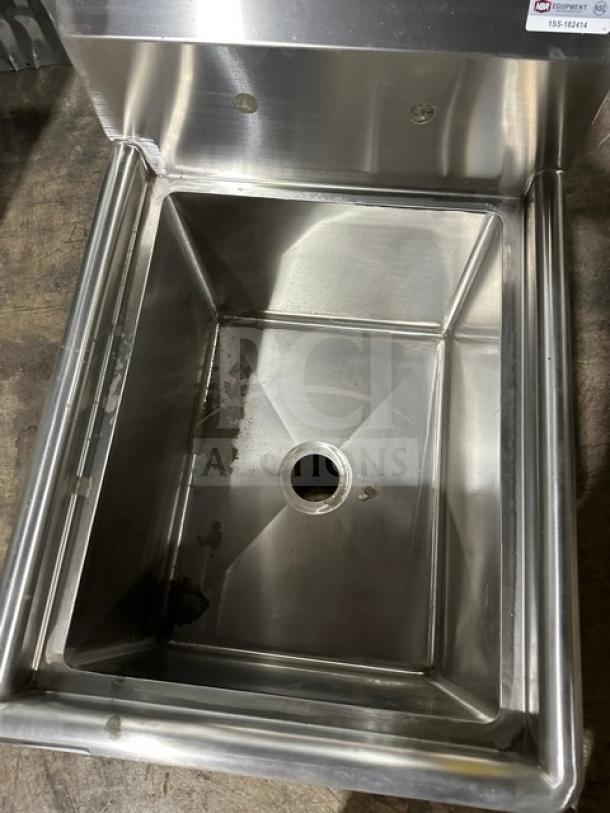 Brand new NBR stainless steel prep sink, model 182414, with legs and strainer. Durable basin, ideal for kitchens.