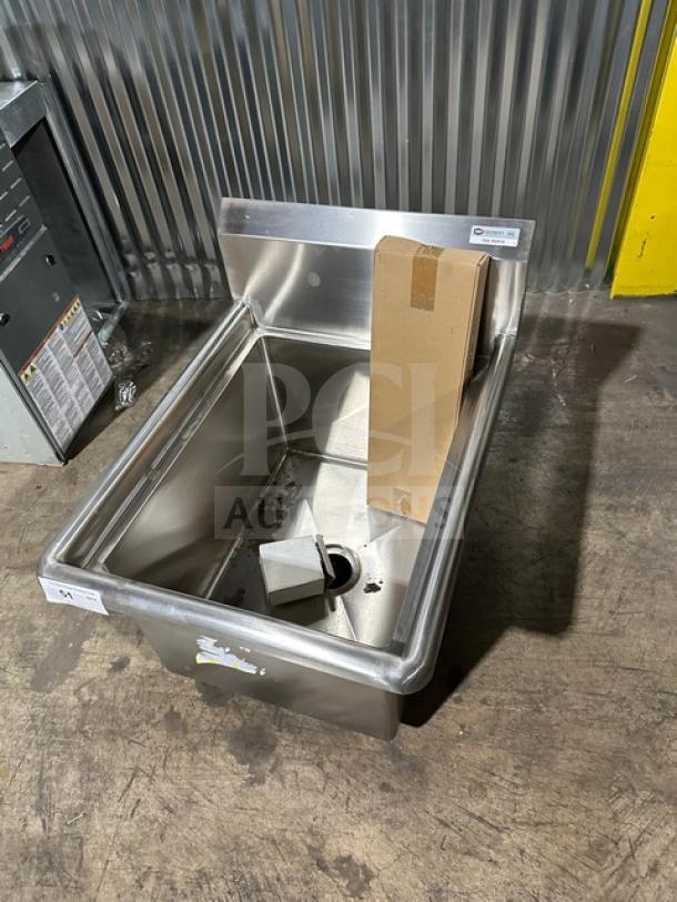 Brand new NBR stainless steel prep sink, model 182414, includes legs and strainer. Shiny condition with visible labels.
