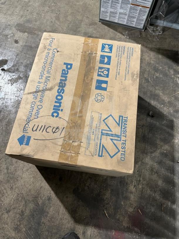 Panasonic Pro Microwave, Model NE1054F, new in box with digital touch pad. Box shows model, 120V 1 Phase, commercial use.