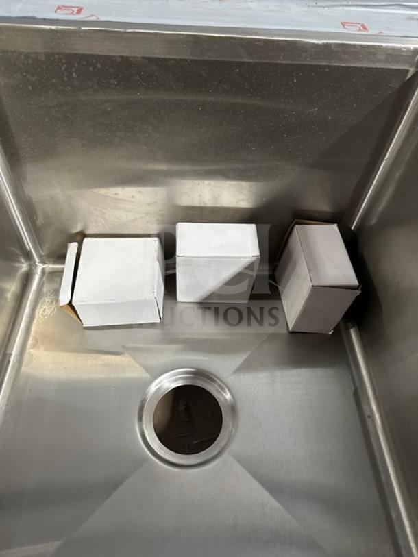 Advance Tabco stainless steel dishwashing sink with three compartments, model DTC-3-2020-10BL. Left drain board shown.